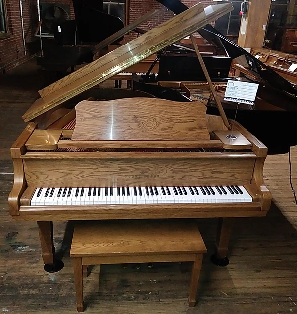 price young chang baby grand piano